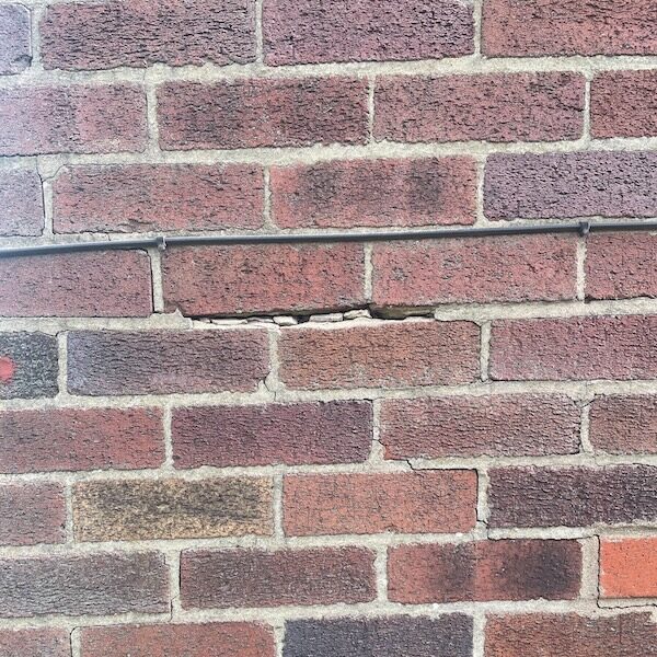 Signs of cavity wall tie failure