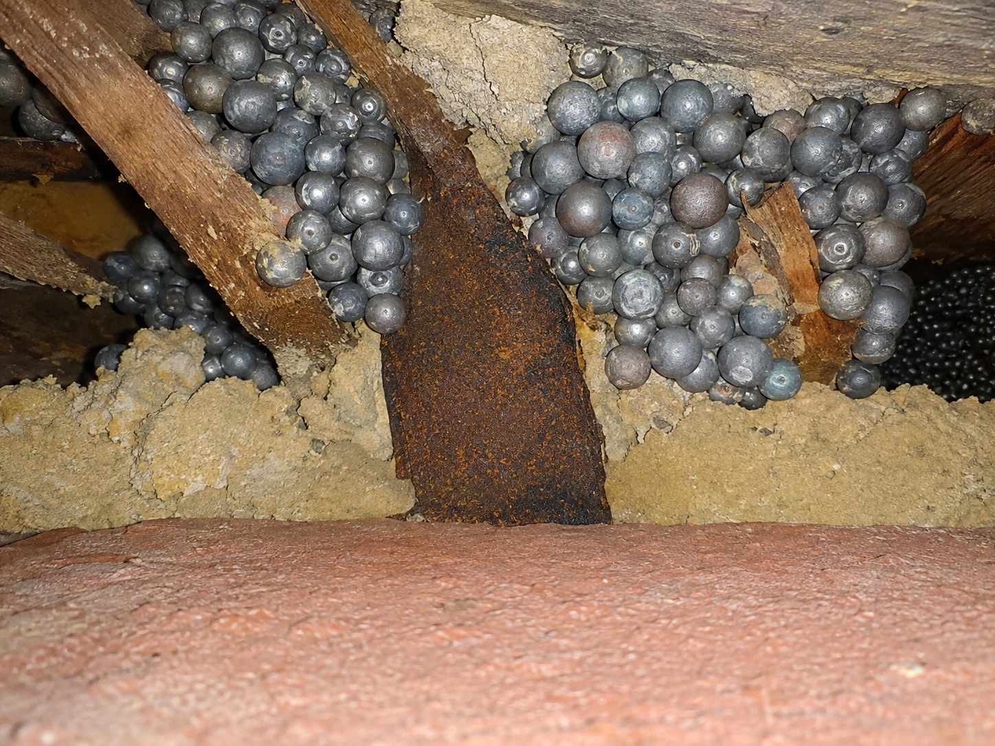 locating a wall tie in an insulated cavity